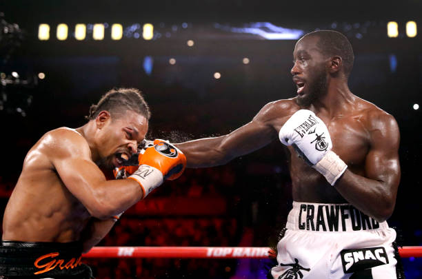 Terence Crawford (right) landing a right hook to the temple of opponent Shawn Porter.