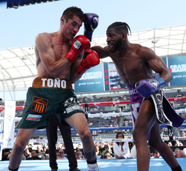 Terence Crawford Narrowly Makes It Past Tough And Skilled Israil Madrimov To Become 4-Weight Champion image 9